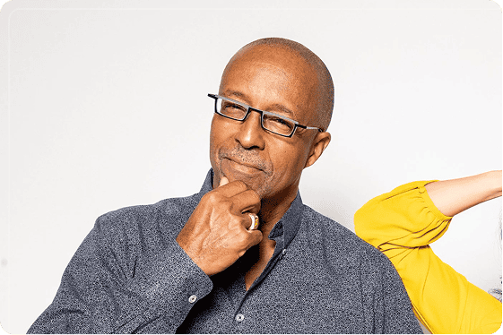 Mark Miles with his hand on his chin, looking thoughtful